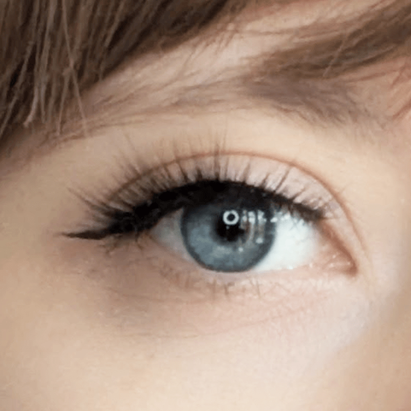Soft, long, elegant lashes on a model's eye.